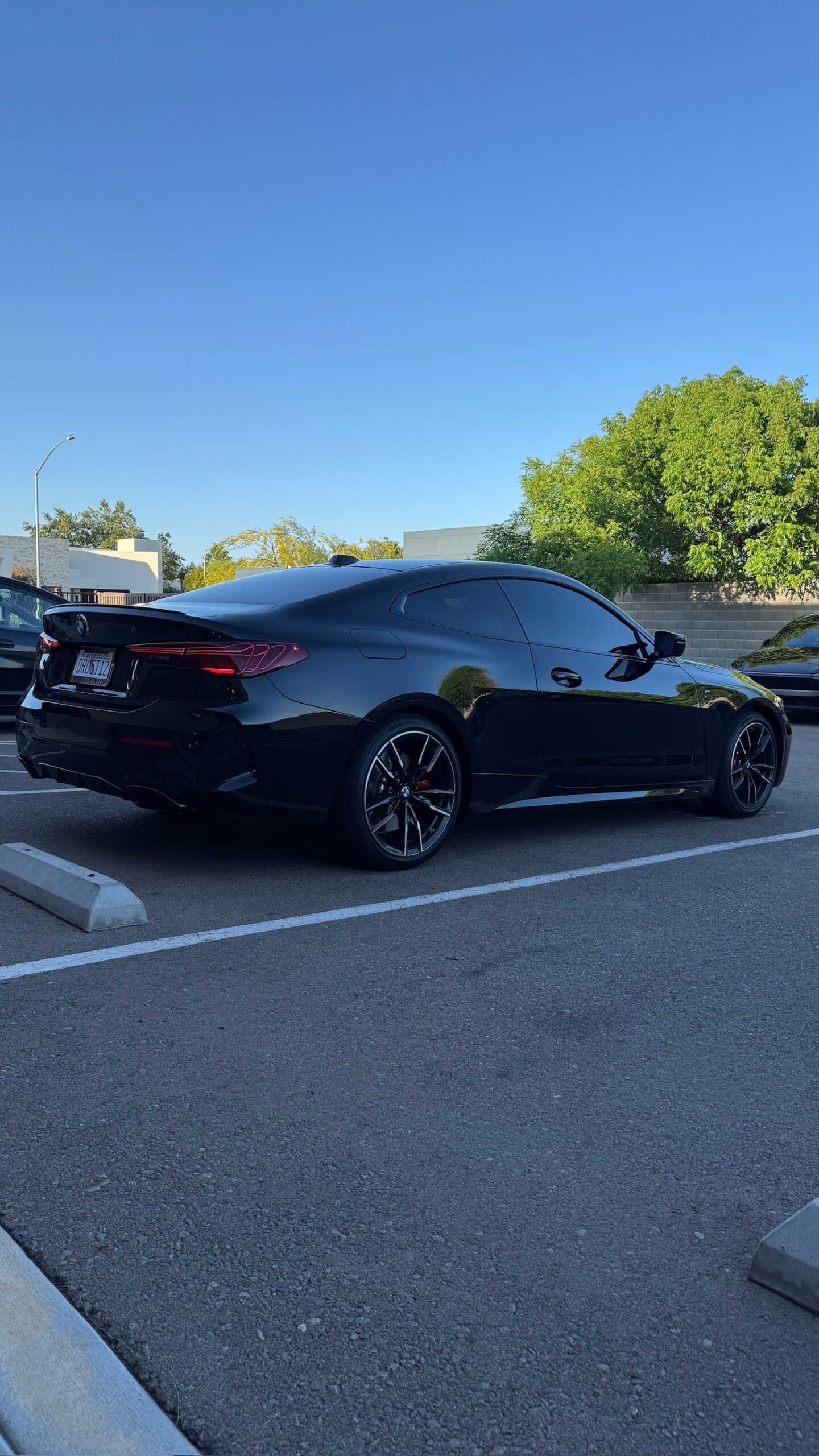Black vehicle with PPF and ceramic coating combo — Precision Auto Detailing